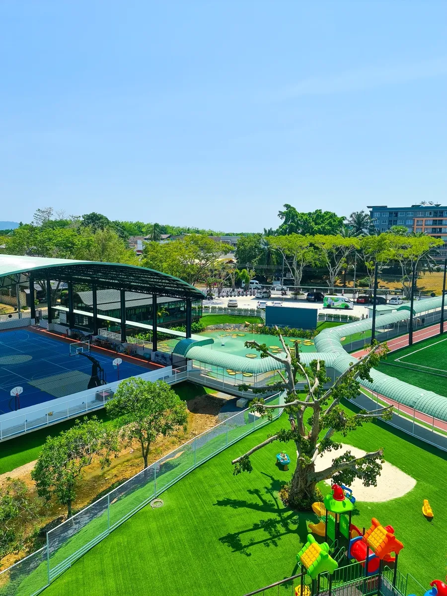 Aerial photo of the Oak Meadow campus with sports courts and playground